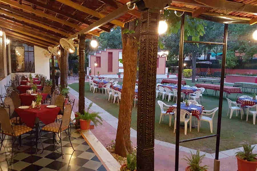 Outdoor seating at Exotic Resort Near Fateh Sagar Lake