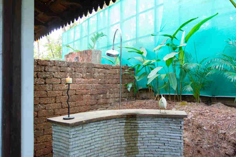 Outside shower in the Caraway Room at Colonial Portuguese Bungalow At Moira