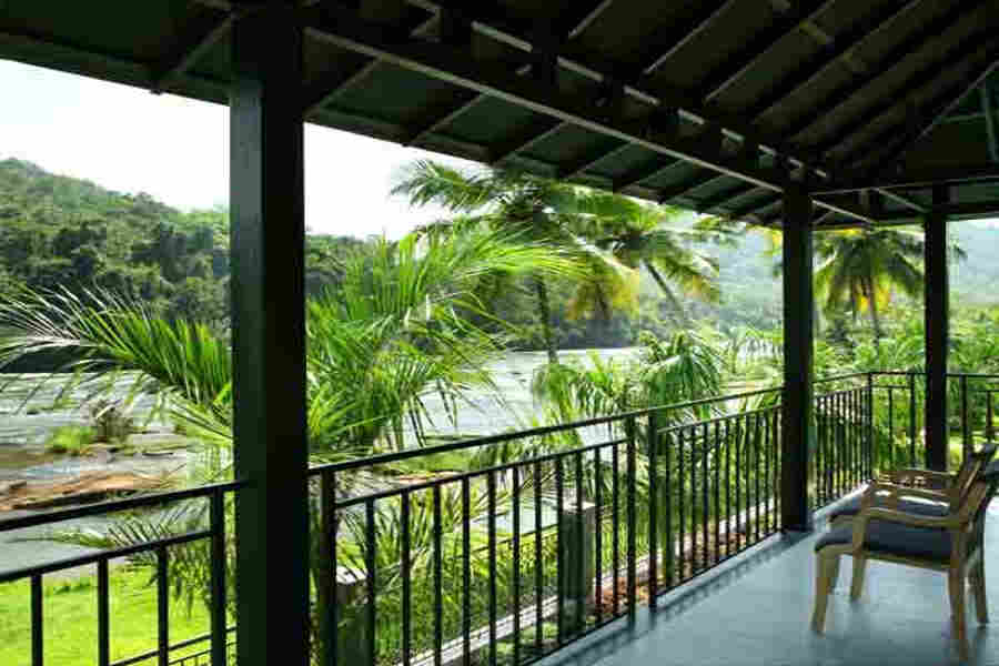 Verandah at Hillside Resort Near Athirapilly Waterfalls