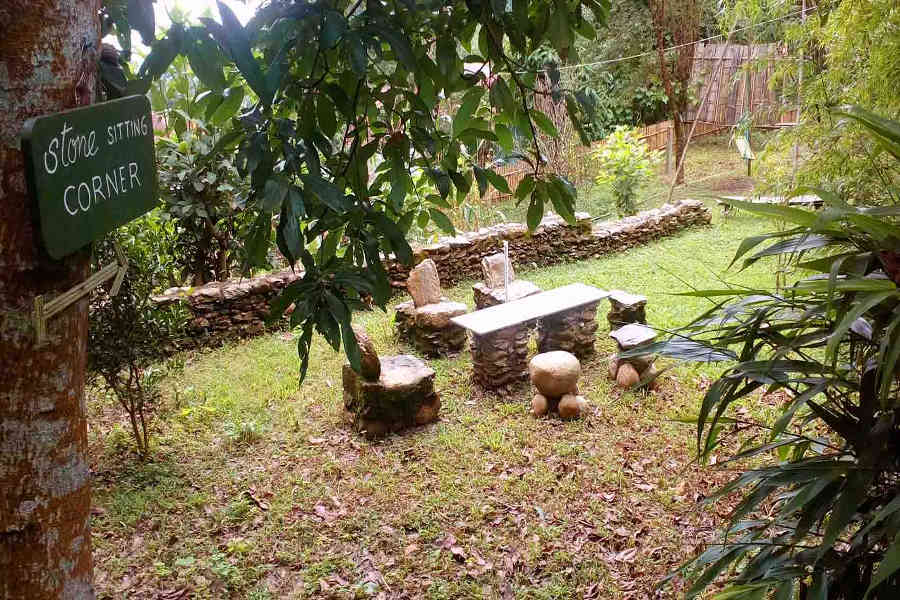 Stone seats at the Serene Retreat In Kalimpong