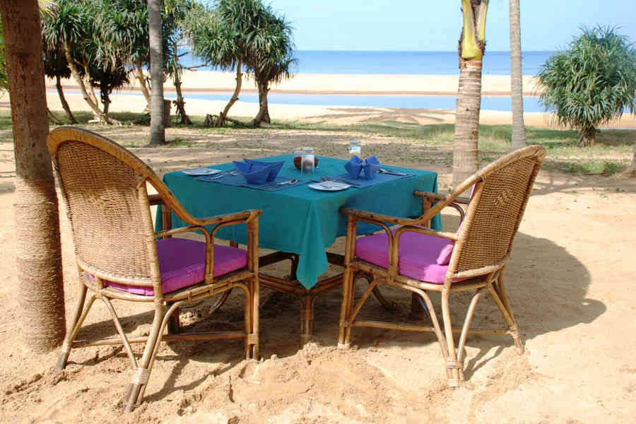 Dining on the beach at the Tranquil Hideaway At Nileshwar