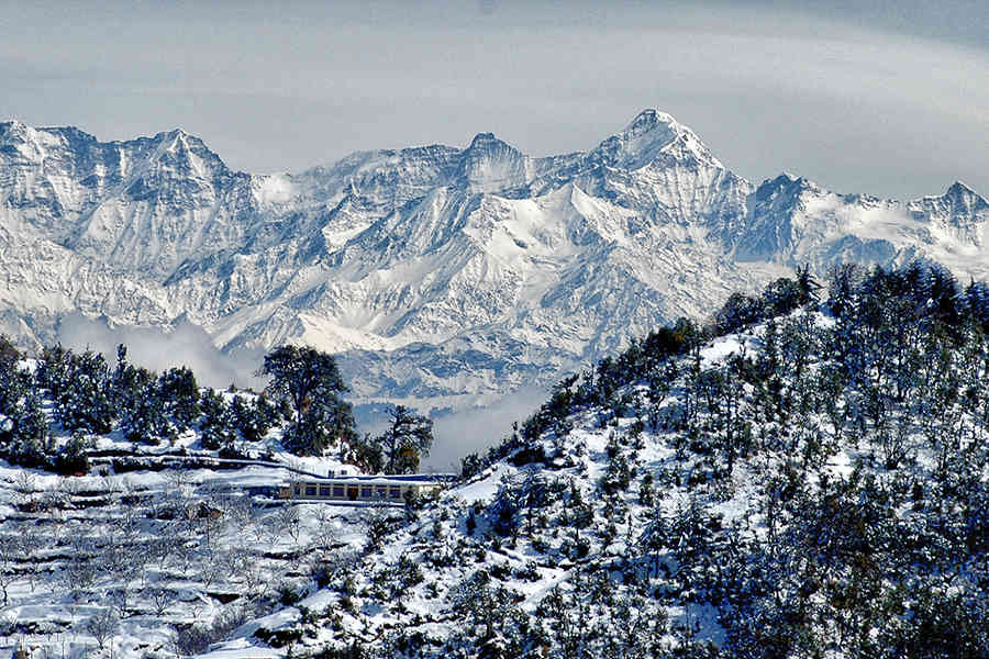 Snow clad Scenic Spa And Resort In Mussoorie