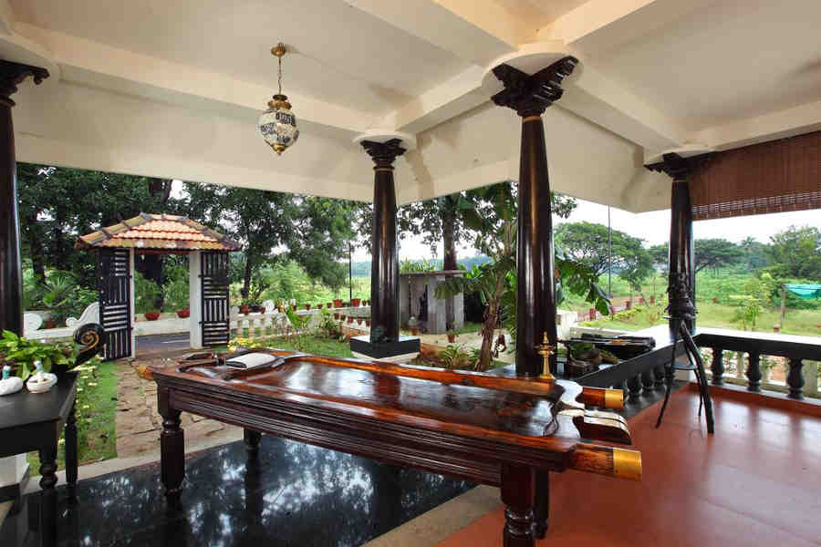 Ayurveda tables at Traditional Ayurvedic Resort near Nila River