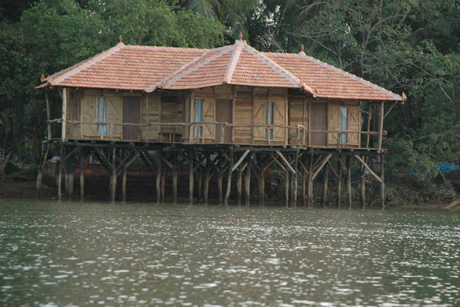 Stilt huts at the Island Stay In Kundapur